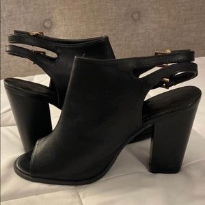 Open toe sling back heels. Size 9.